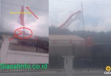 Parah!! Penampakan Gagang Sapu Jadi Tiang Bendera Diatas Pagar Warga Pelak Gedang Kerinci Bikin Pengendara Terperangah