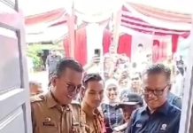Kadis Kominfo Ariansyah Gunting Pita Bedah Rumah Bantuan PT. Semen Padang